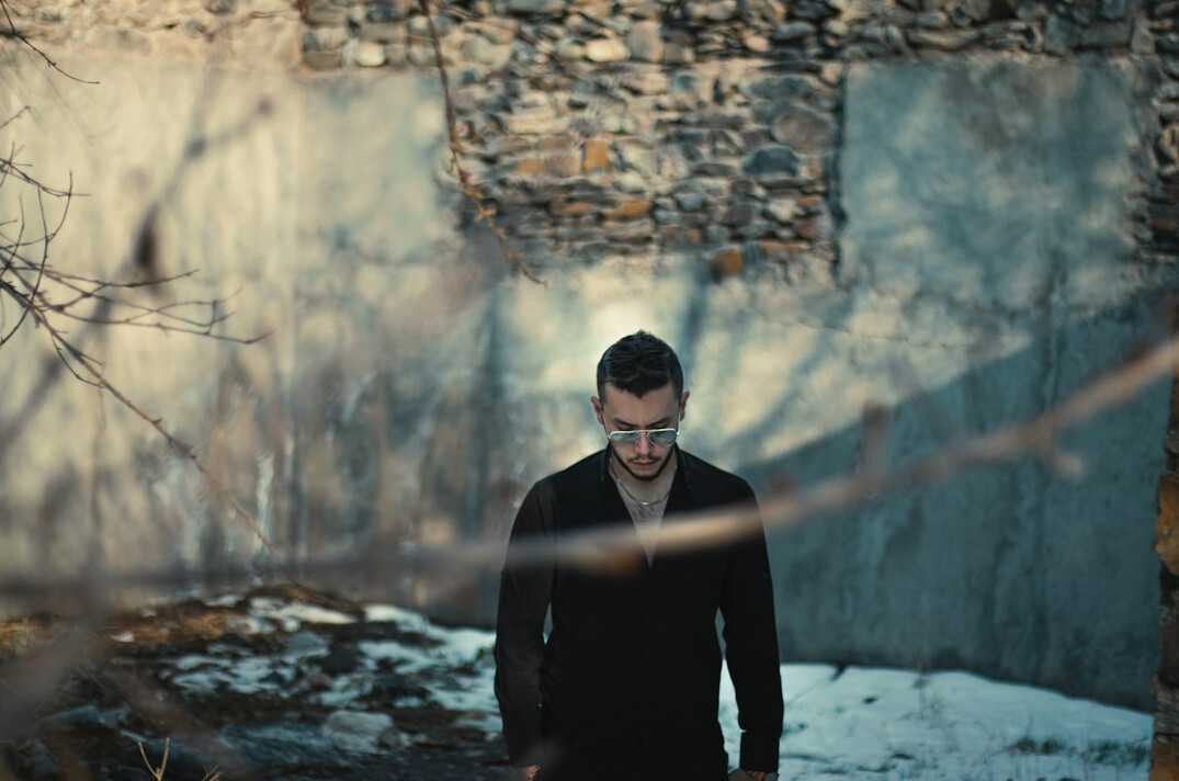 Portrait of a man in a dark suit jacket