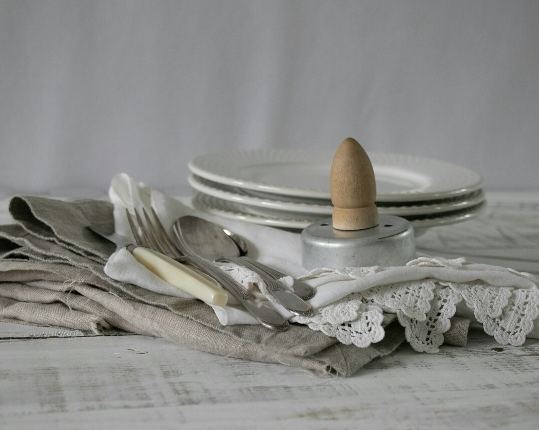 Stack of vintage newspapers on a table