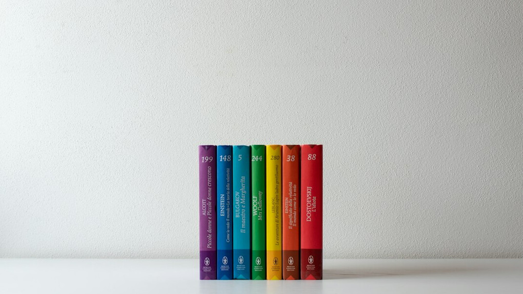 Colorful books stacked on a table