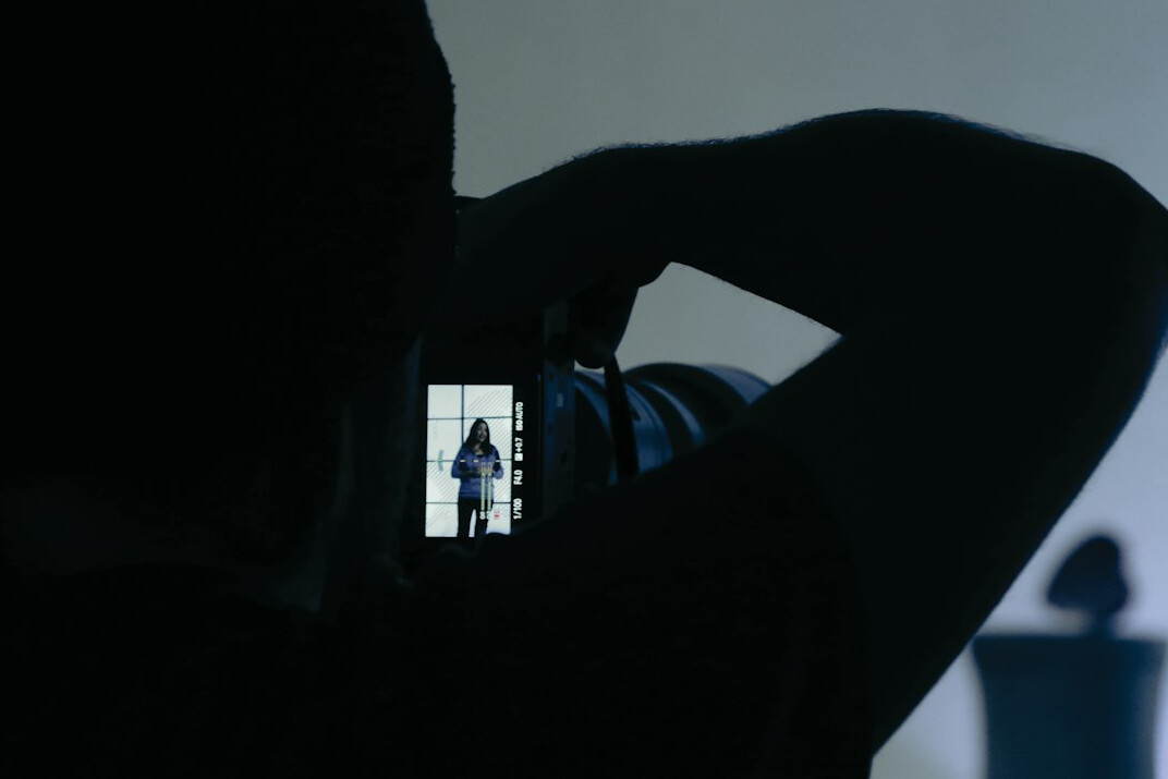 detective reviewing video
