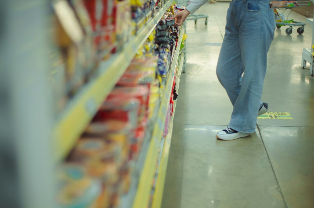 store detective observing shoppers